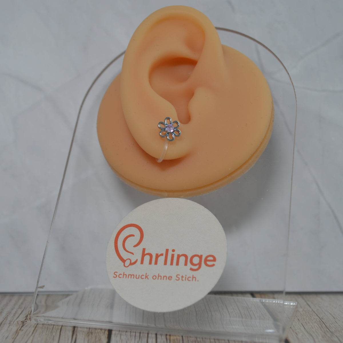 Silberne Blume mit Glitzerstein